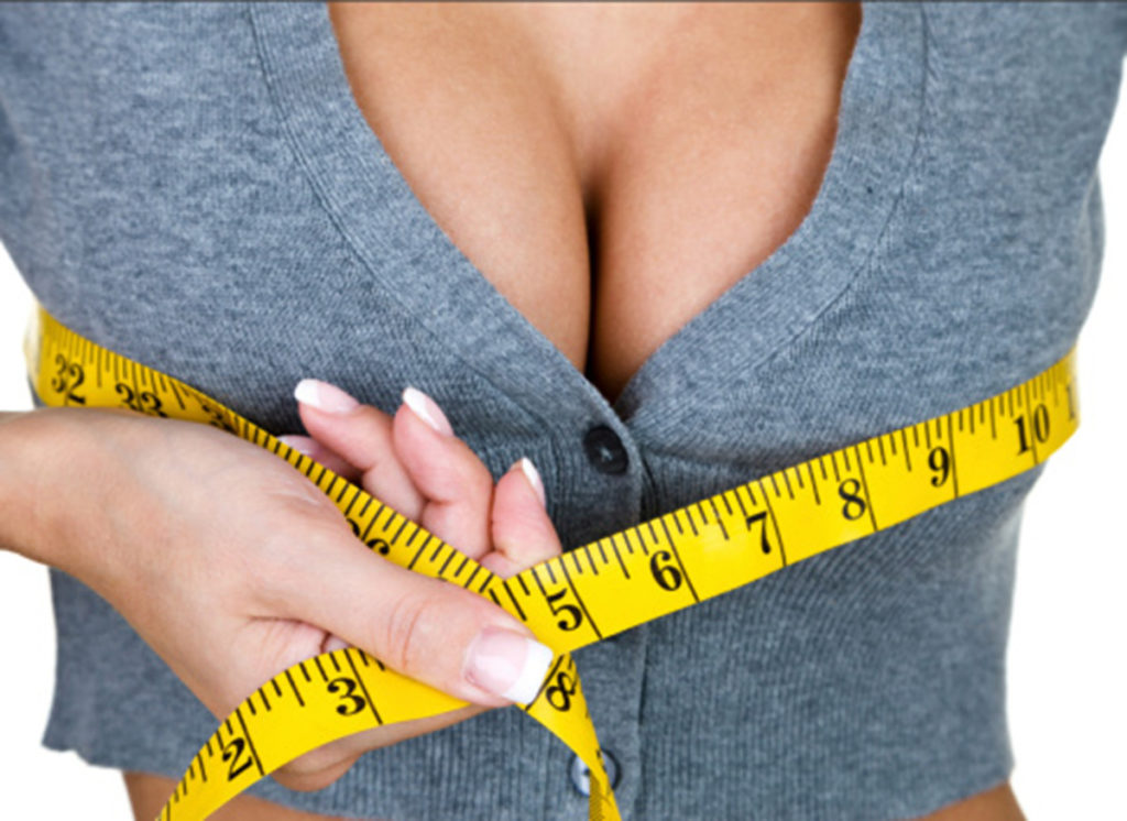 Mr Mark Gittos Blog - Are bigger breast always better blog - Woman with Tape Measure on Breast